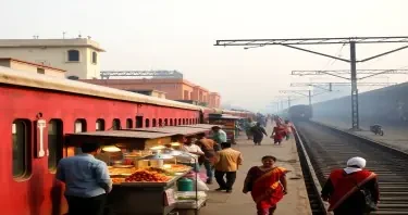 Old Delhi Railway platform with food hawkers & Minarites of red for being included. In light colours