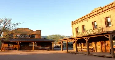 a photorealistic picture of an old wild west Hotel building close on the front porch