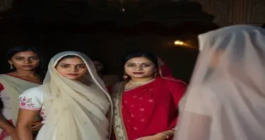 A senior female Dancing coach at the Nawab's Haweli" is very caring and sympathetic to the young girls who have been trafficed into this business. All are fair complexioned, full bodied . The whole scen is in a haweli setting