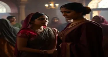 A senior female Dancing coach at the Nawab's Haweli" is very caring and sympathetic to the young girls who have been trafficed into this business. All are fair complexioned, full bodied . The whole scen is in a haweli setting