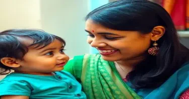 A cute picture of an Indian Mother looking affectionately at her two years old child. Both fair complexioned at